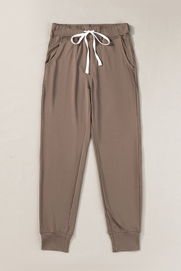 Cozy dark brown joggers with adjustable drawstring and pockets