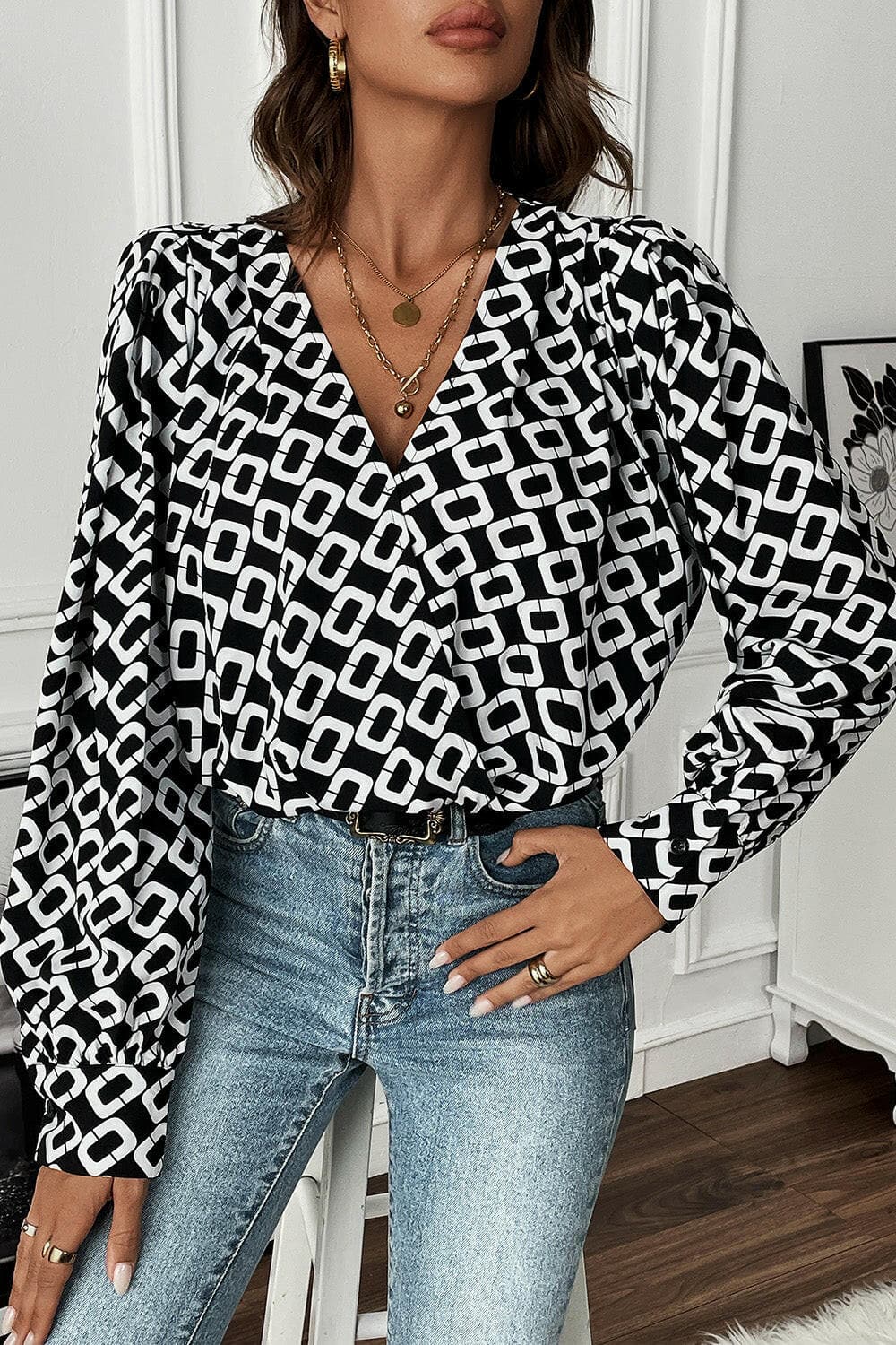 Geometric V-Neck Long Sleeve BlouseUpgrade Your Wardrobe with Style: Geometric V-Neck Long Sleeve Blouse
 Indulge in elegance and sophistication with our Geometric V-Neck Long Sleeve Blouse. Elevate yLove Salve -Neck Long Sleeve BlouseBlouses