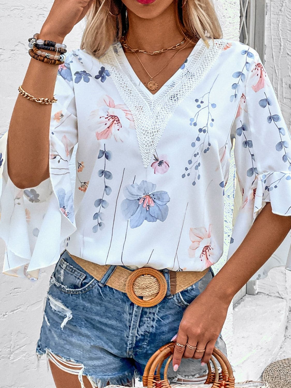 Ruffled Printed V-Neck Half Sleeve Blouse.