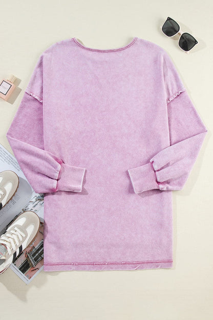 Round Neck Dropped Shoulder Sweatshirt.