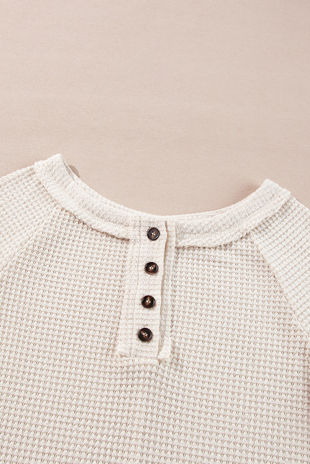 Cozy oatmeal waffle knit blouse with buttoned front and raglan sleeves