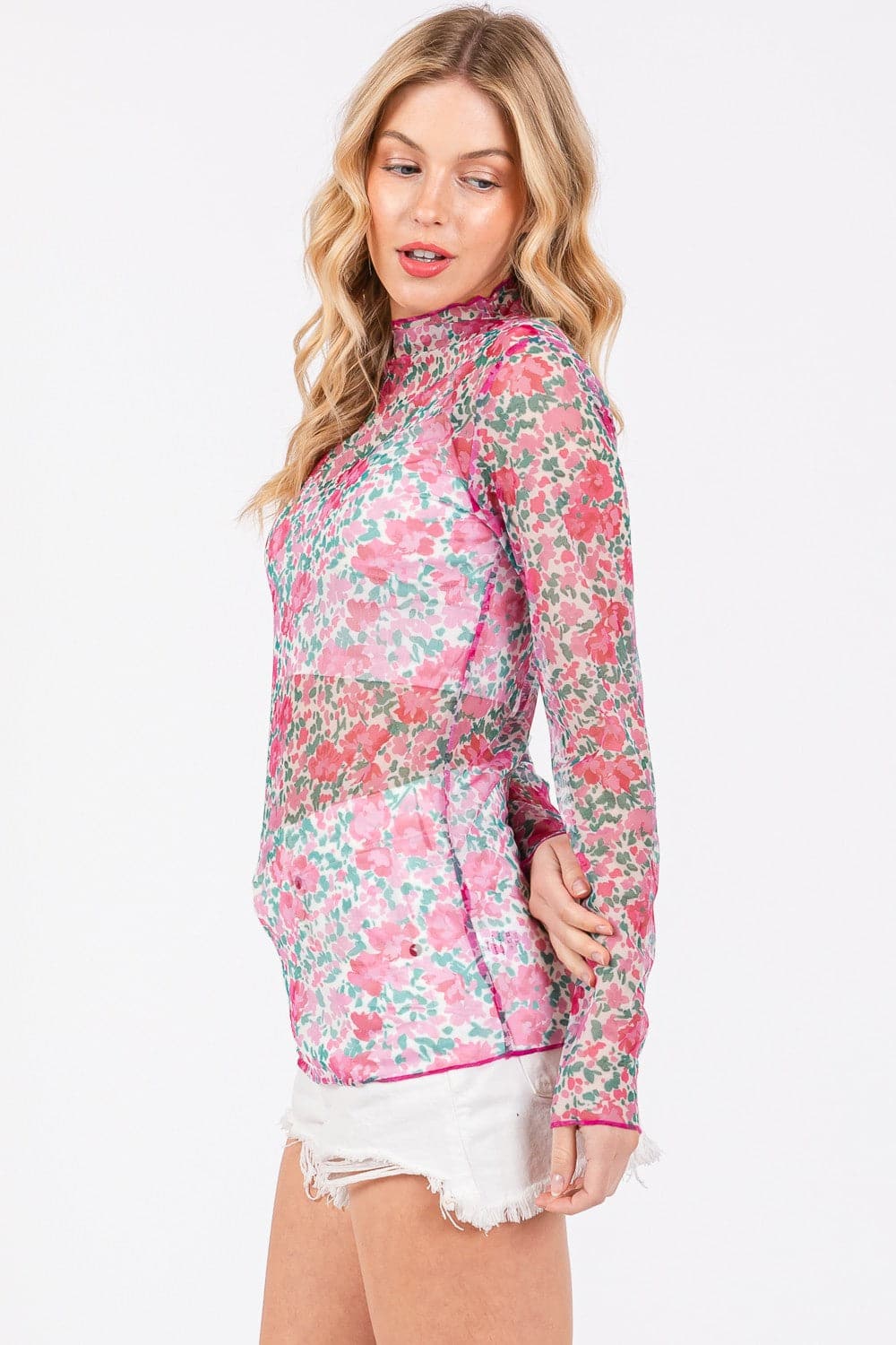 SAGE + FIG Floral Mesh Long Sleeve TopThe Floral Mesh Long Sleeve Top is a stylish and trendy addition to your wardrobe. Featuring a delicate floral pattern on breathable mesh fabric, this top is perfectLove Salve SAGE + FIG Floral Mesh Long Sleeve TopShirts