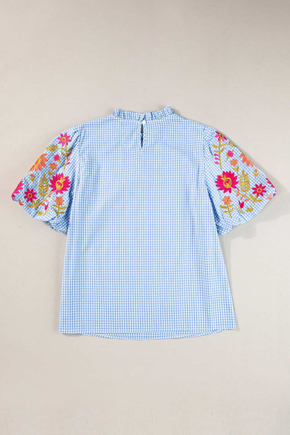 Light blue floral blouse with puff sleeves