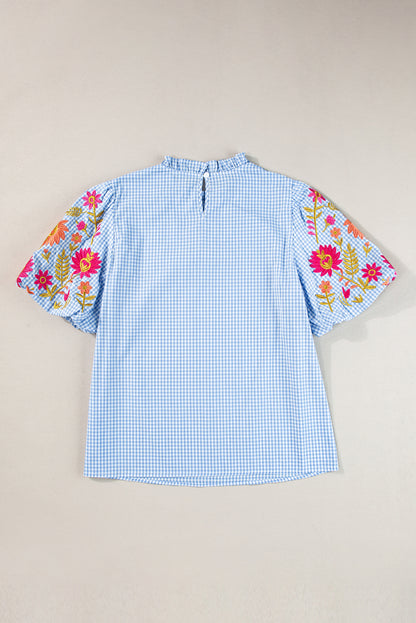 Light blue floral blouse with puff sleeves