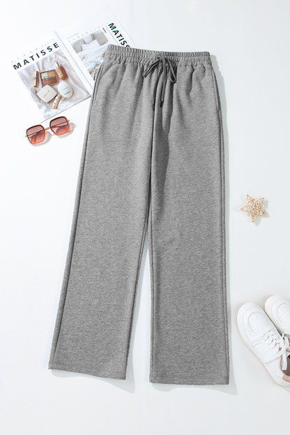 Cozy light grey fleece-lined casual pants with adjustable drawstring waist