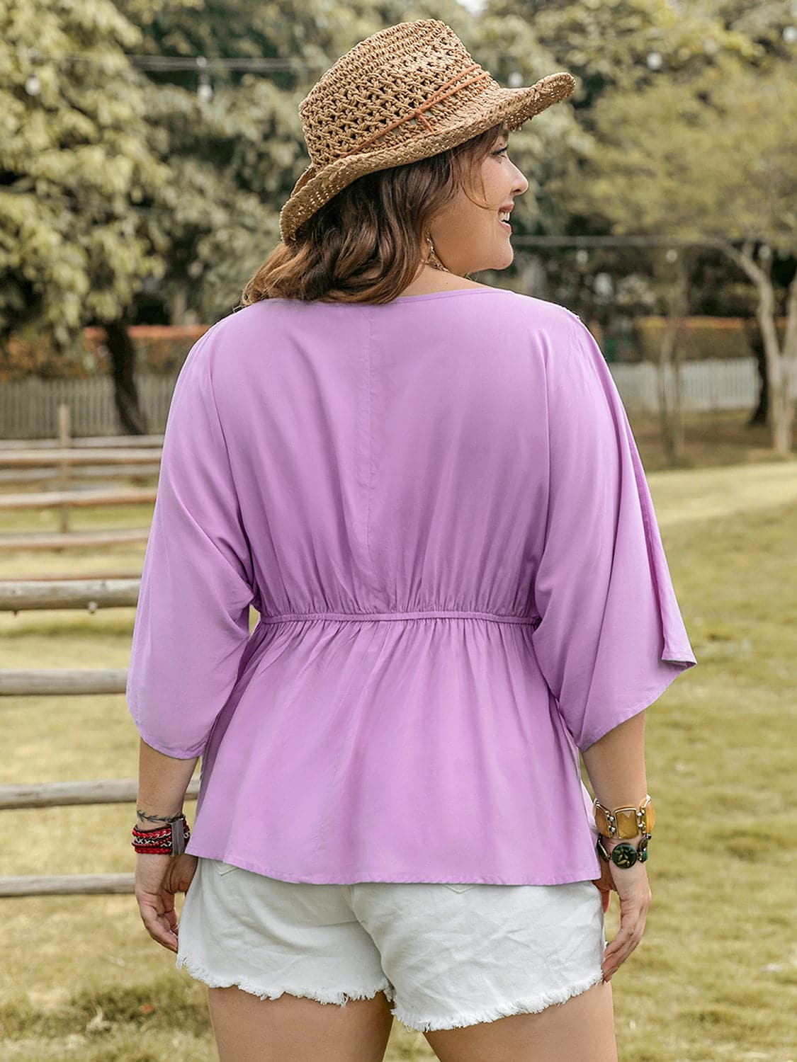 Plus Size Lace Detail Round Neck Three-Quarter Sleeve Blouse.