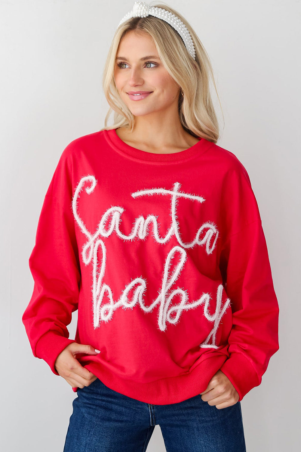 Festive red Santa baby tinsel graphic cozy sweatshirt