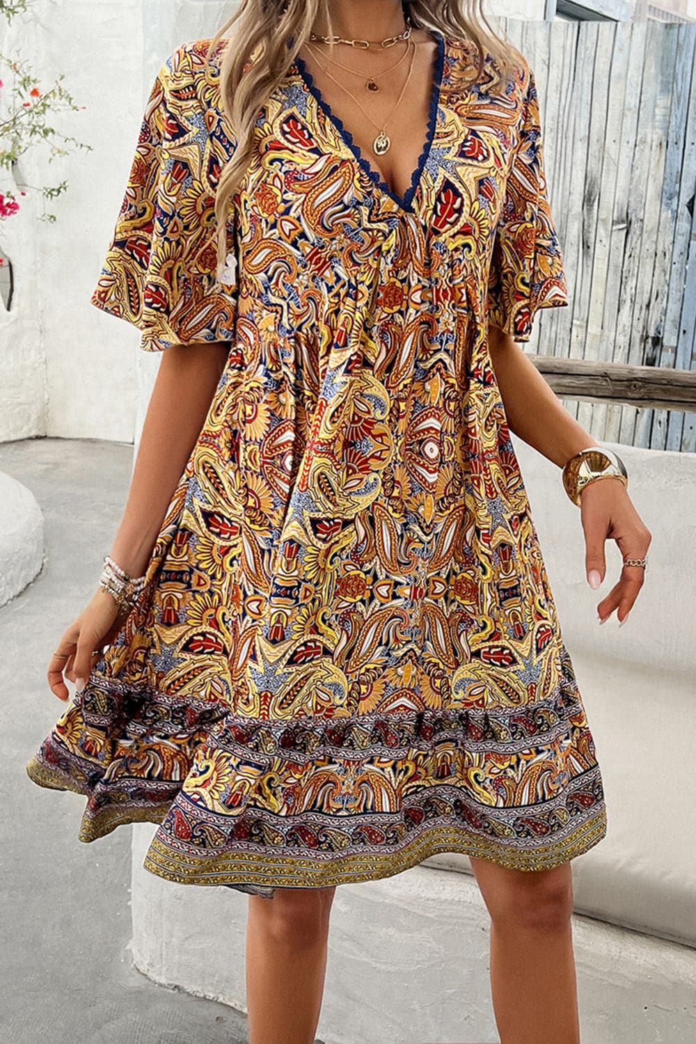 Printed V-Neck Half Sleeve Mini Dress.