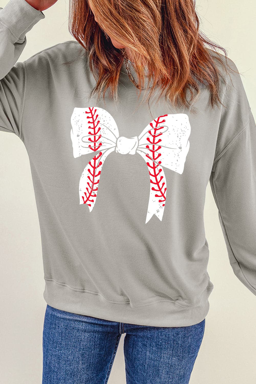 Bow Graphic Round Neck Long Sleeve Sweatshirt.