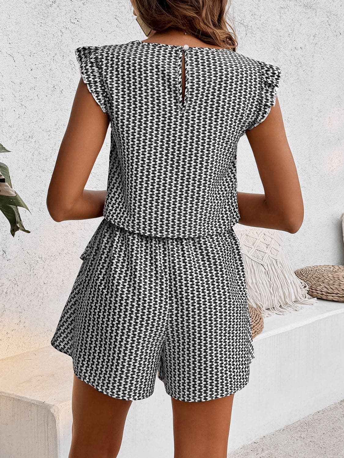 Printed Round Neck Top and Layered Shorts Set.