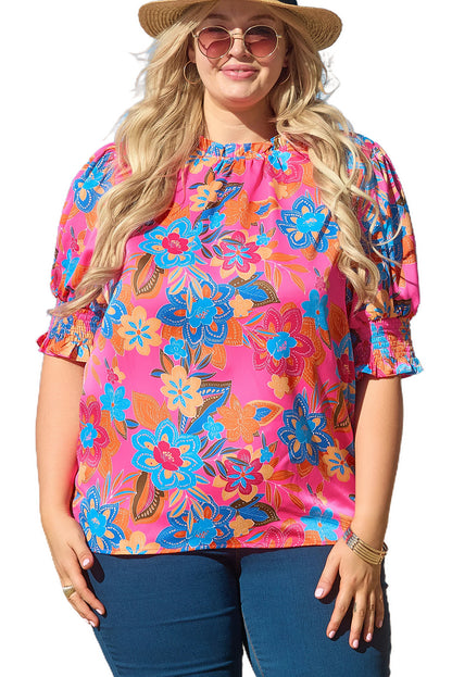 Chic floral print blouse with frilly neck and puff sleeves