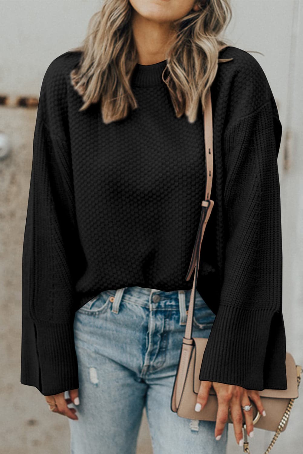 Chic textured long sleeve sweater with stylish slit detail