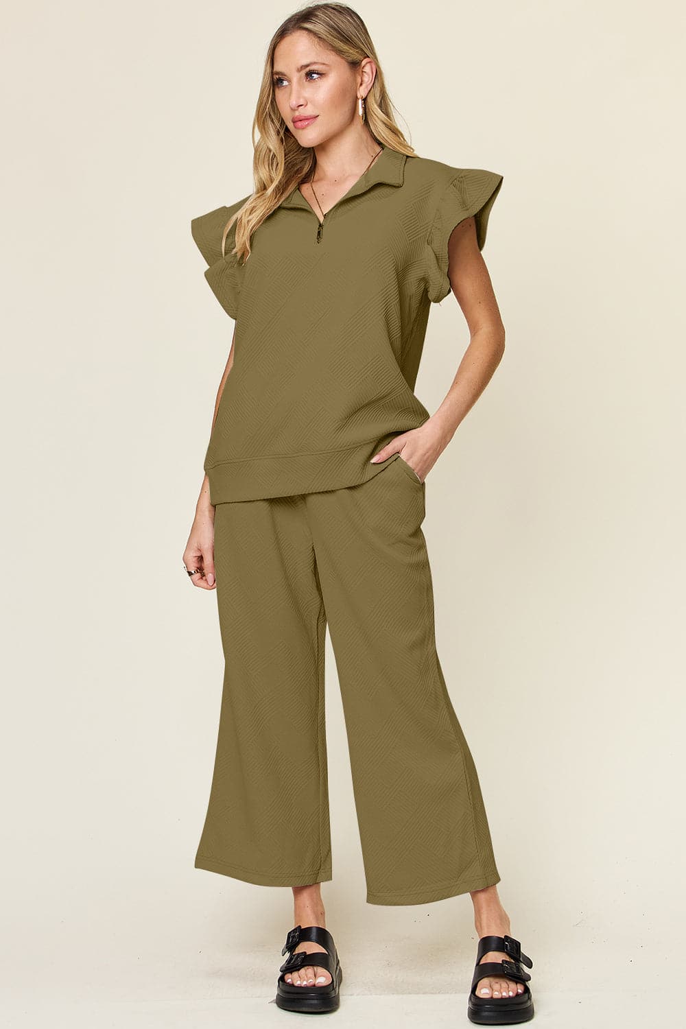 Double Take Texture Ruffle Short Sleeve Top and Drawstring Wide Leg PaFeatures: Drawstring, Pocketed
Number of pieces: Two-piece
Stretch: Slightly stretchy
Material composition: 97% polyester, 3% spandex
Care instructions: Machine washLove Salve Texture Ruffle Short Sleeve TopTwo-Piece Sets