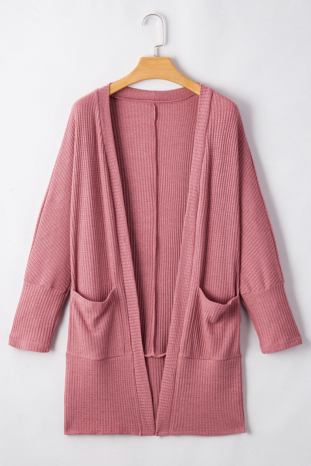 Cozy mineral red waffle knit cardigan with pocket detail