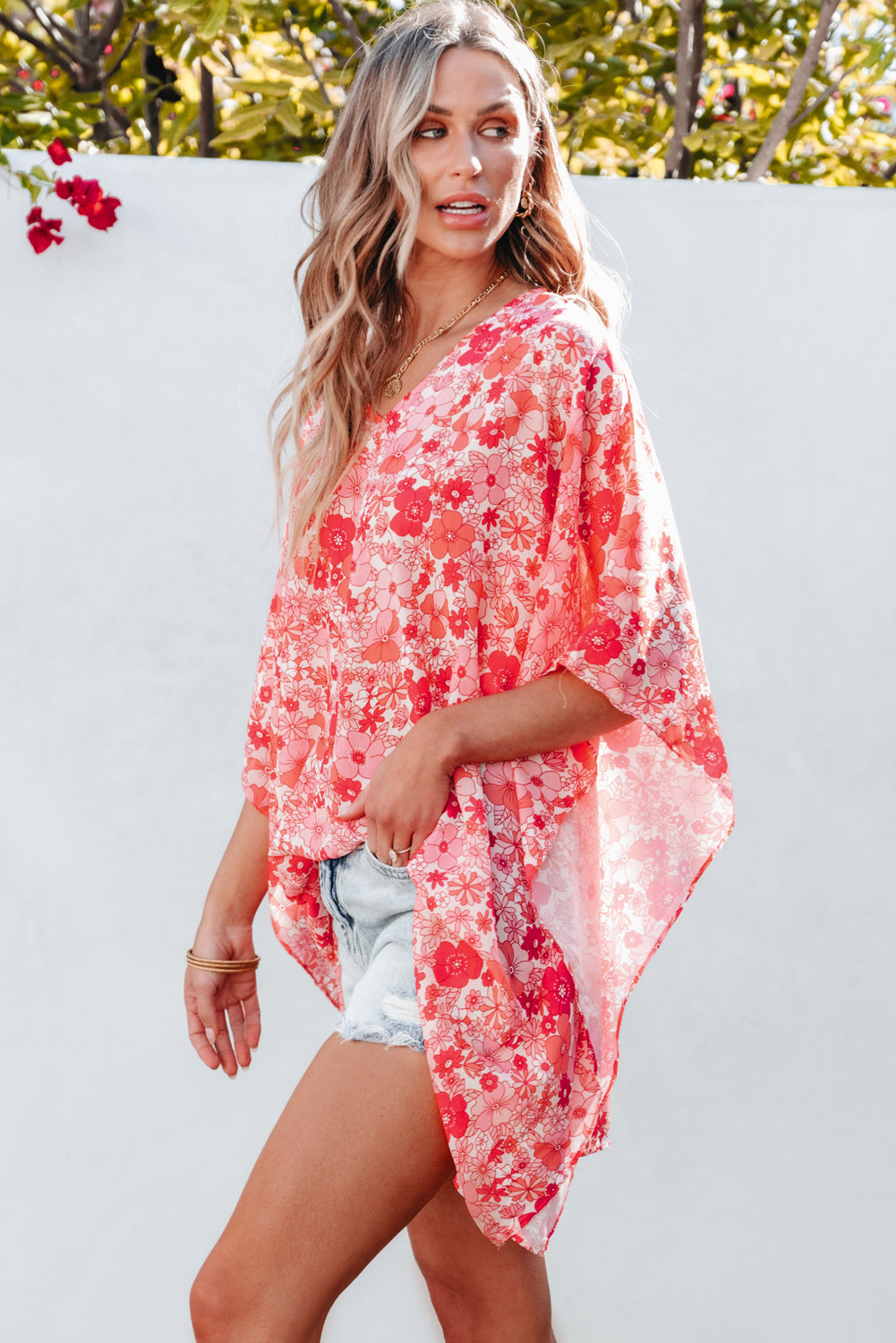 Pink floral boho kimono-style blouse with V neckline