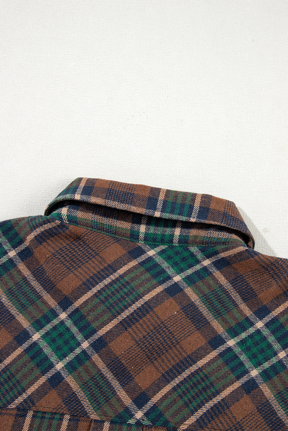 Brown plaid button-up shacket with chest pockets