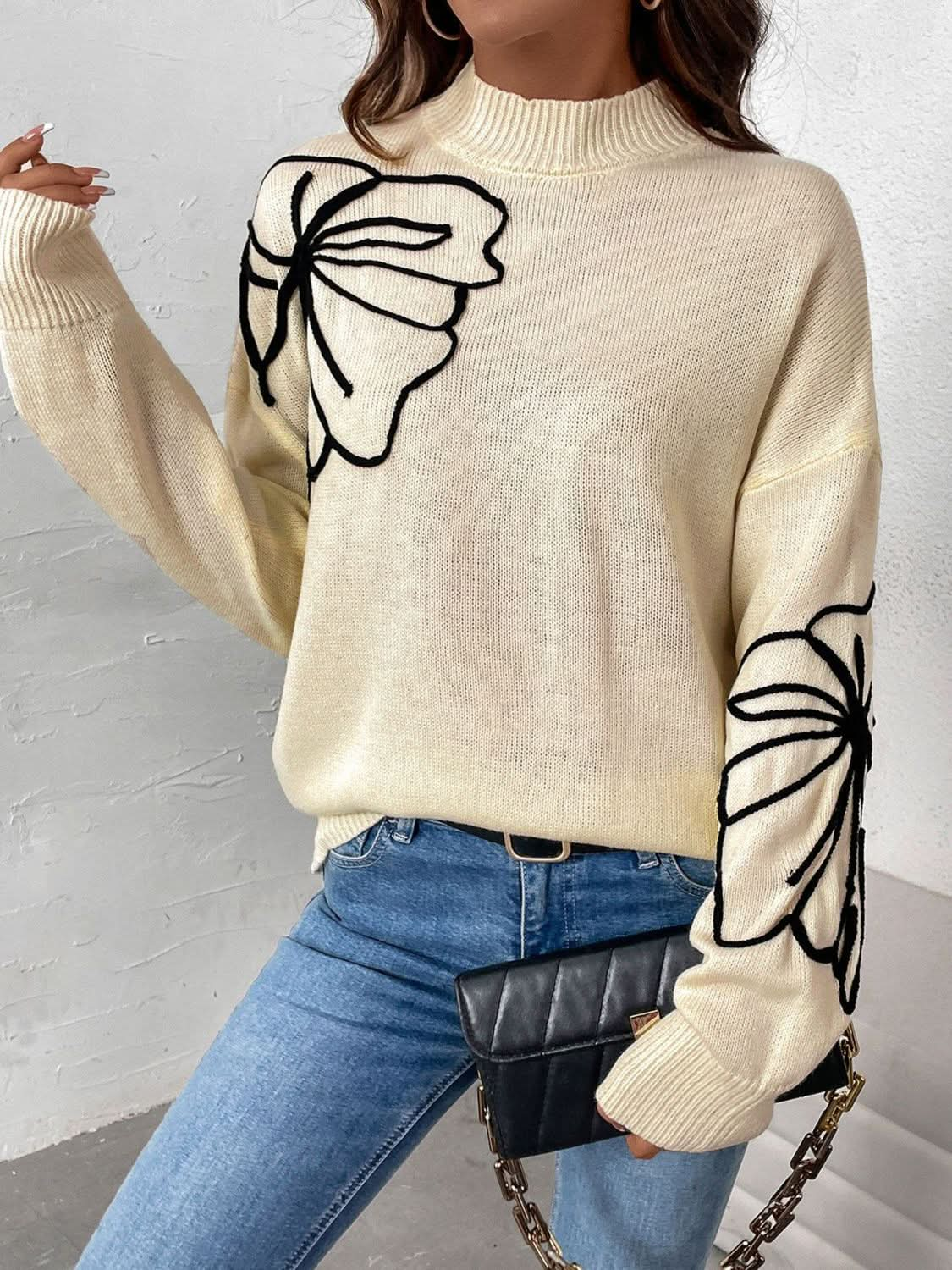 Cozy mock neck sweater with dropped shoulders and long sleeves