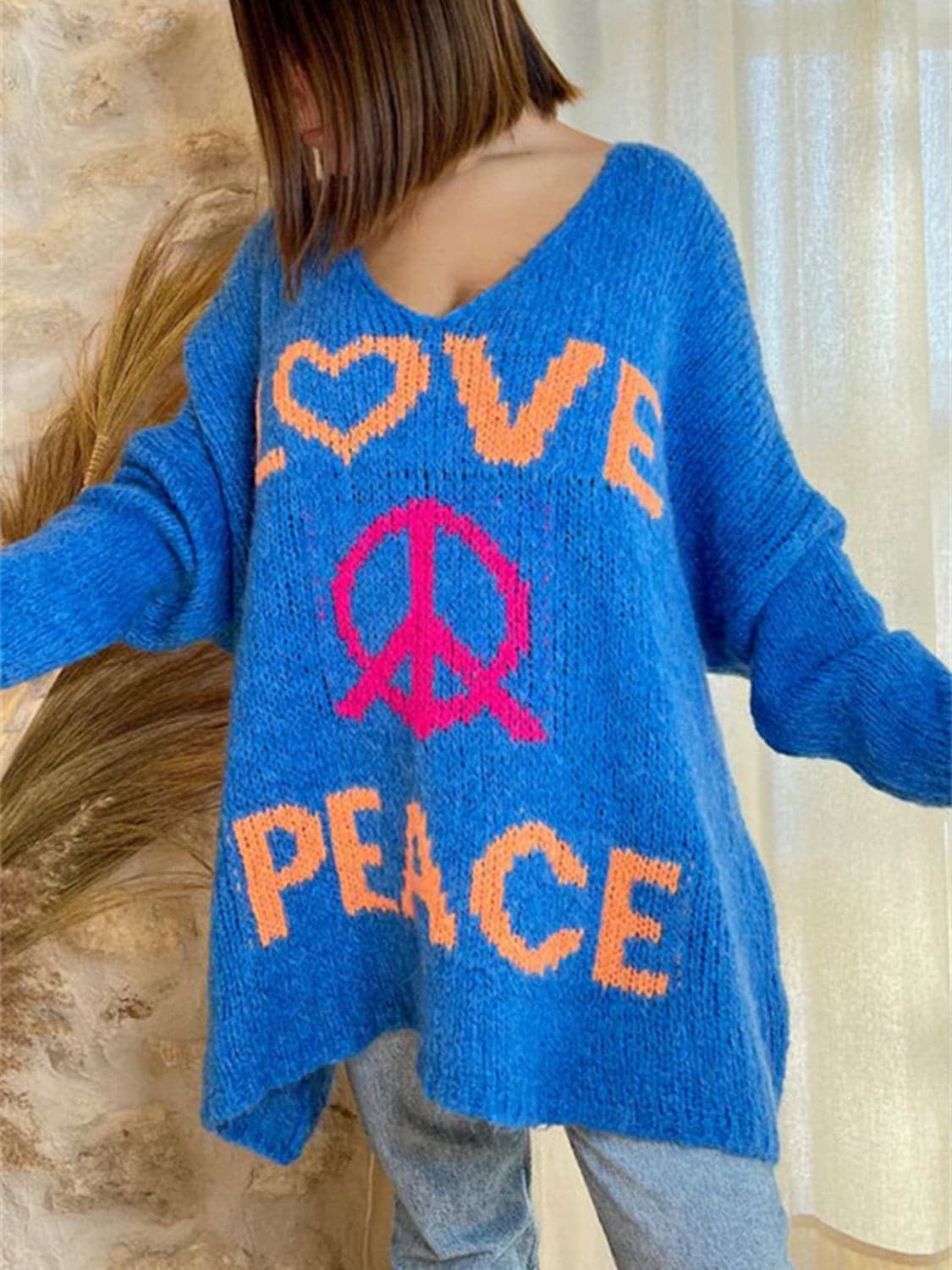 Peace Graphic V-Neck Long Sleeve Sweater.