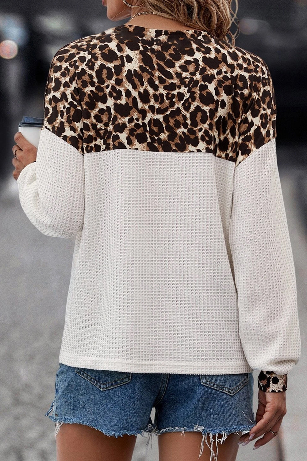 Stylish white leopard print waffle knit top with button details