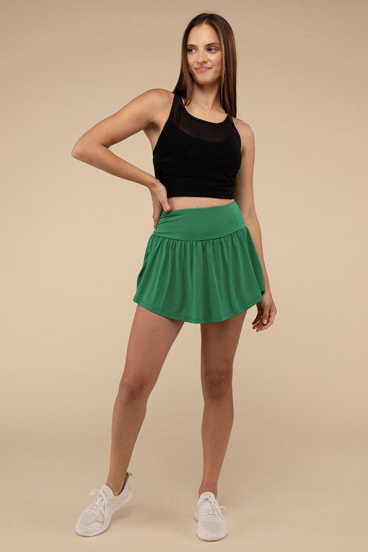 Wide band tennis skirt with pocket