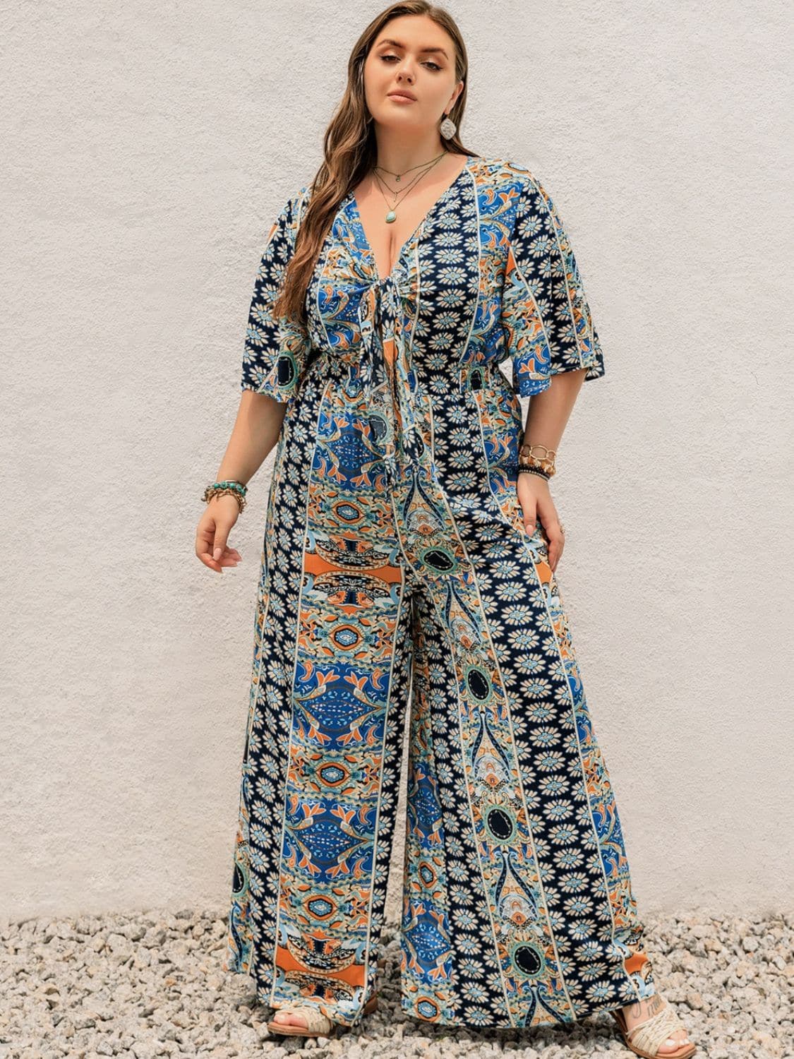 Plus Size Printed Half Sleeve Wide Leg Jumpsuit.