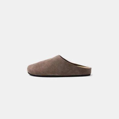 Suede slip-on flats with a round toe design