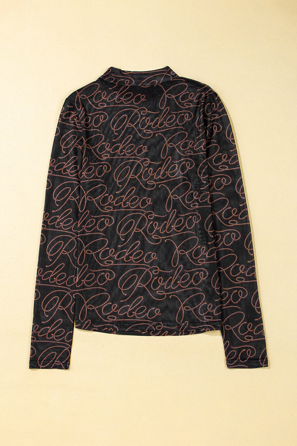 Rodeo chic: Black mesh long sleeve top with western print