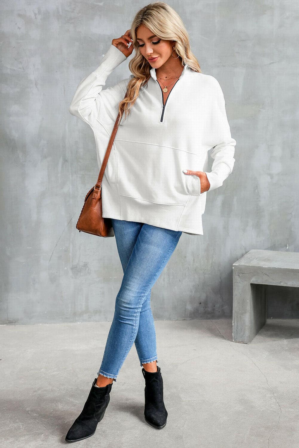 Half Zip Pocketed Dropped Shoulder Sweatshirt.