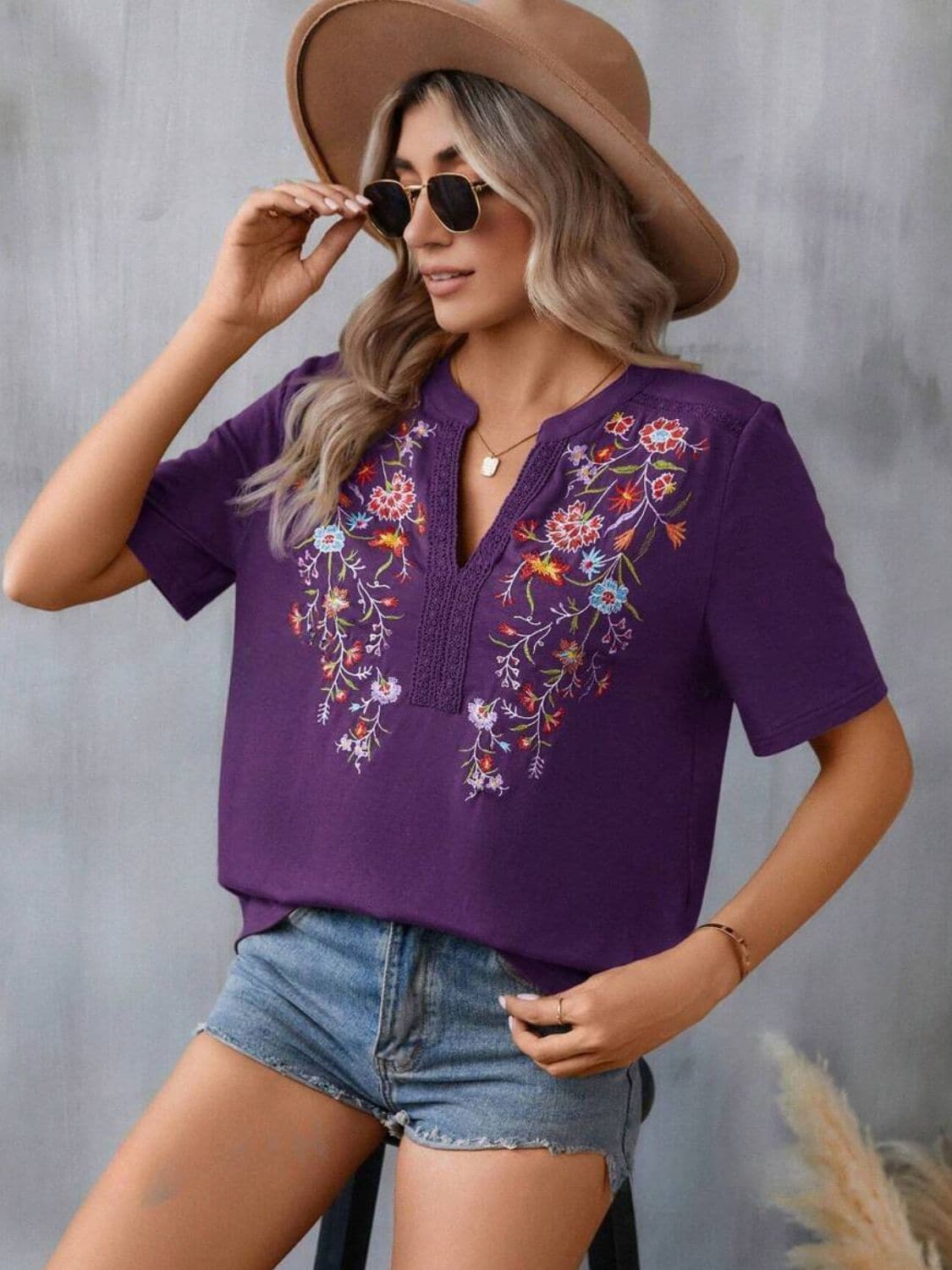 Embroidered Notched Short Sleeve T-Shirt.