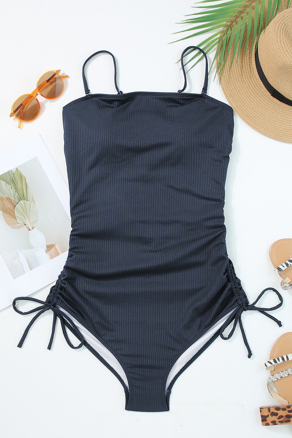 Navy blue ribbed cutout monokini with adjustable drawstring sides