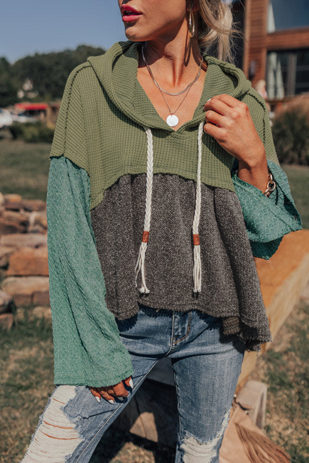 Laurel green colorblock patchwork hooded top with frayed high-low hem