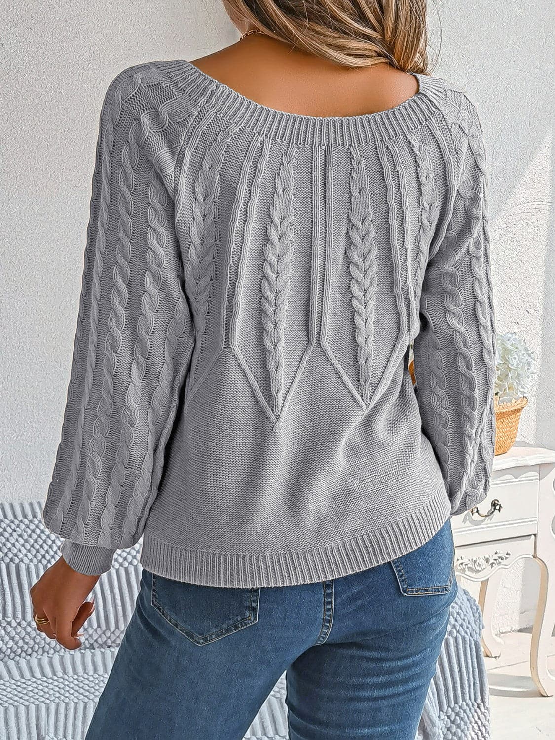 Cable-Knit Round Neck Long Sleeve Sweater.