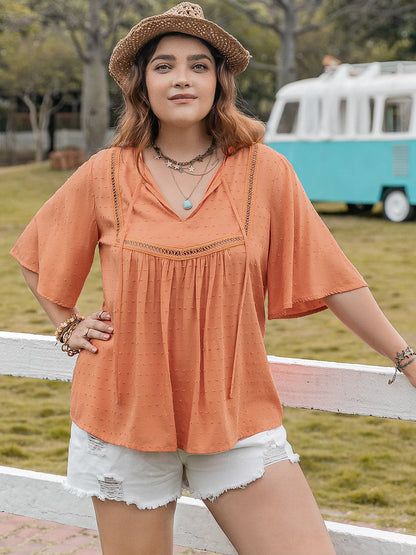 Plus Size Ruched Tie Neck Half Sleeve Blouse.