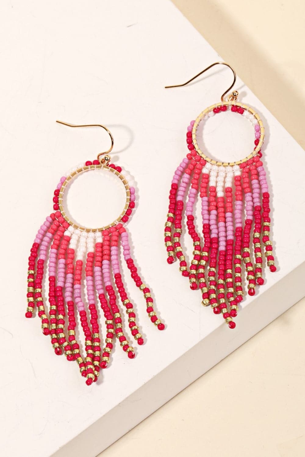 Bohemian circle cutout seed bead fringe earrings