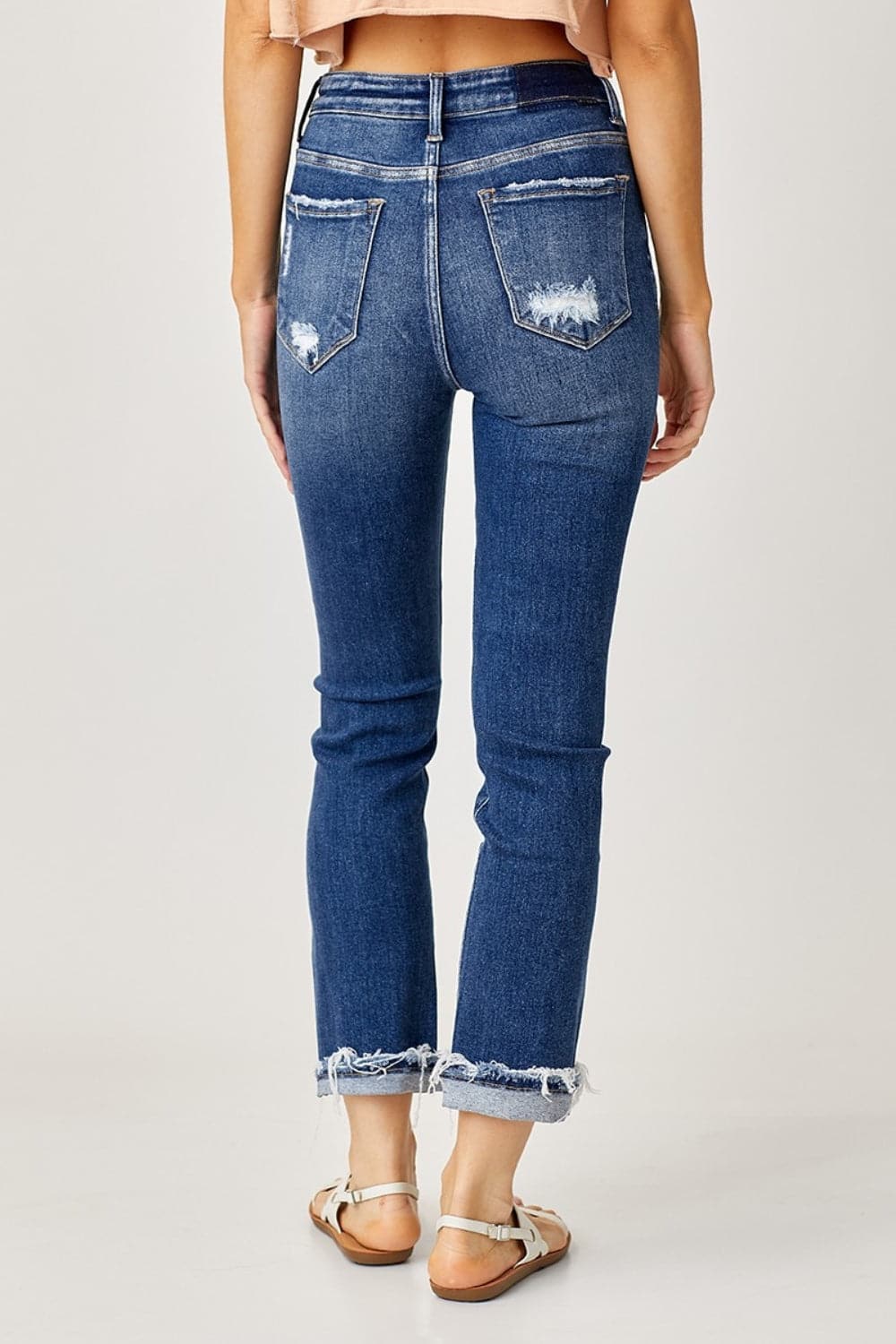 Risen Full Size High-Rise Frayed Cuffed Straight Jeans.