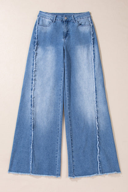 Vintage-inspired Beau Blue flared jeans with raw hem detailing