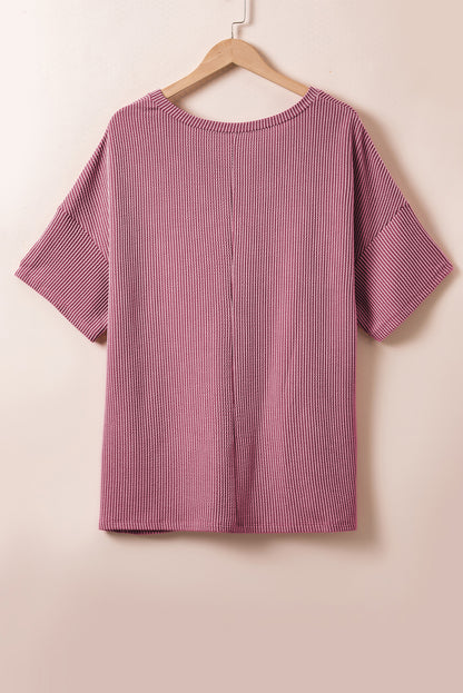 Chic rose pink textured plus t-shirt with v-neck and dropped shoulders