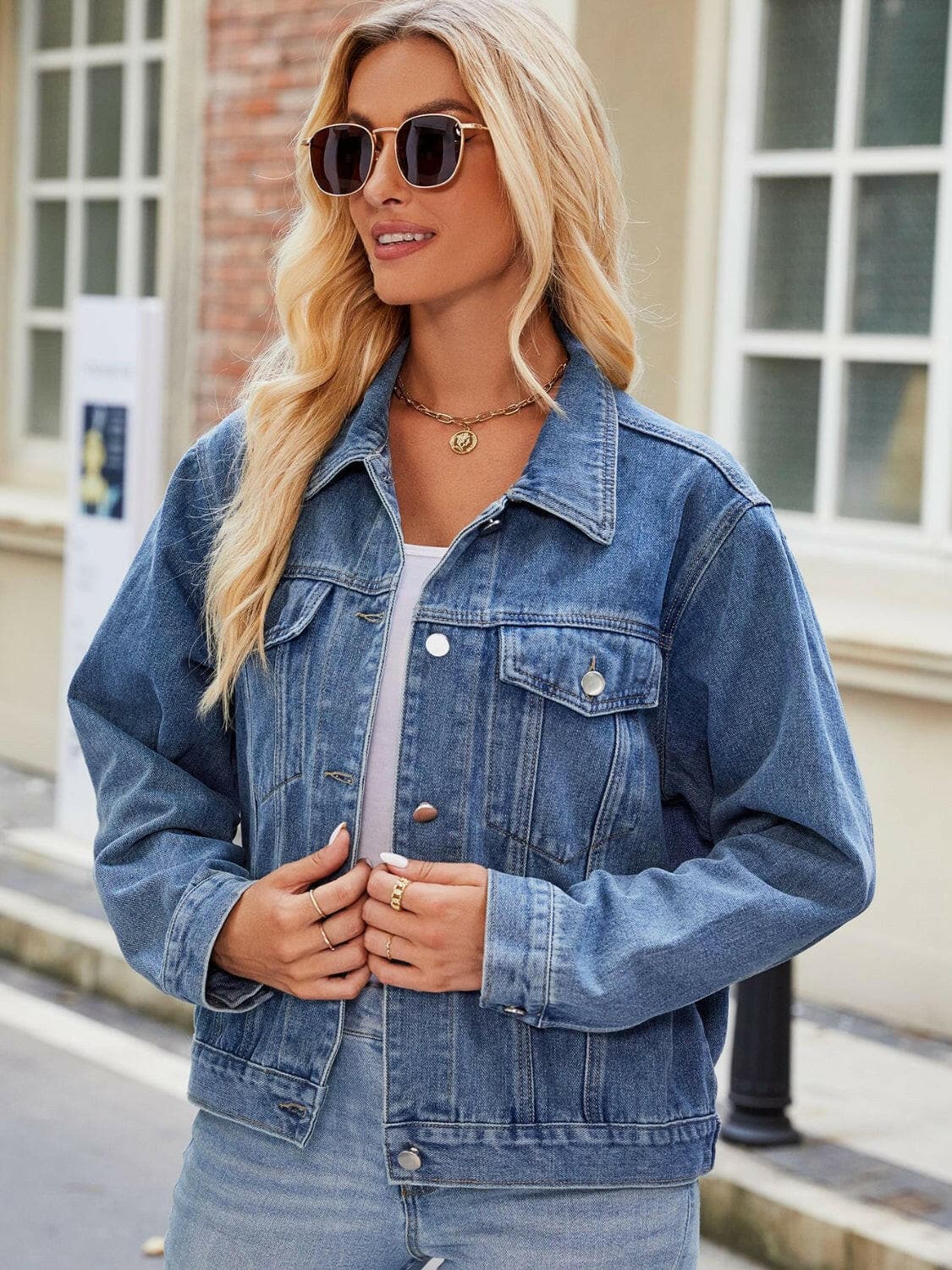 Pocketed Collared Neck Denim Jacket.