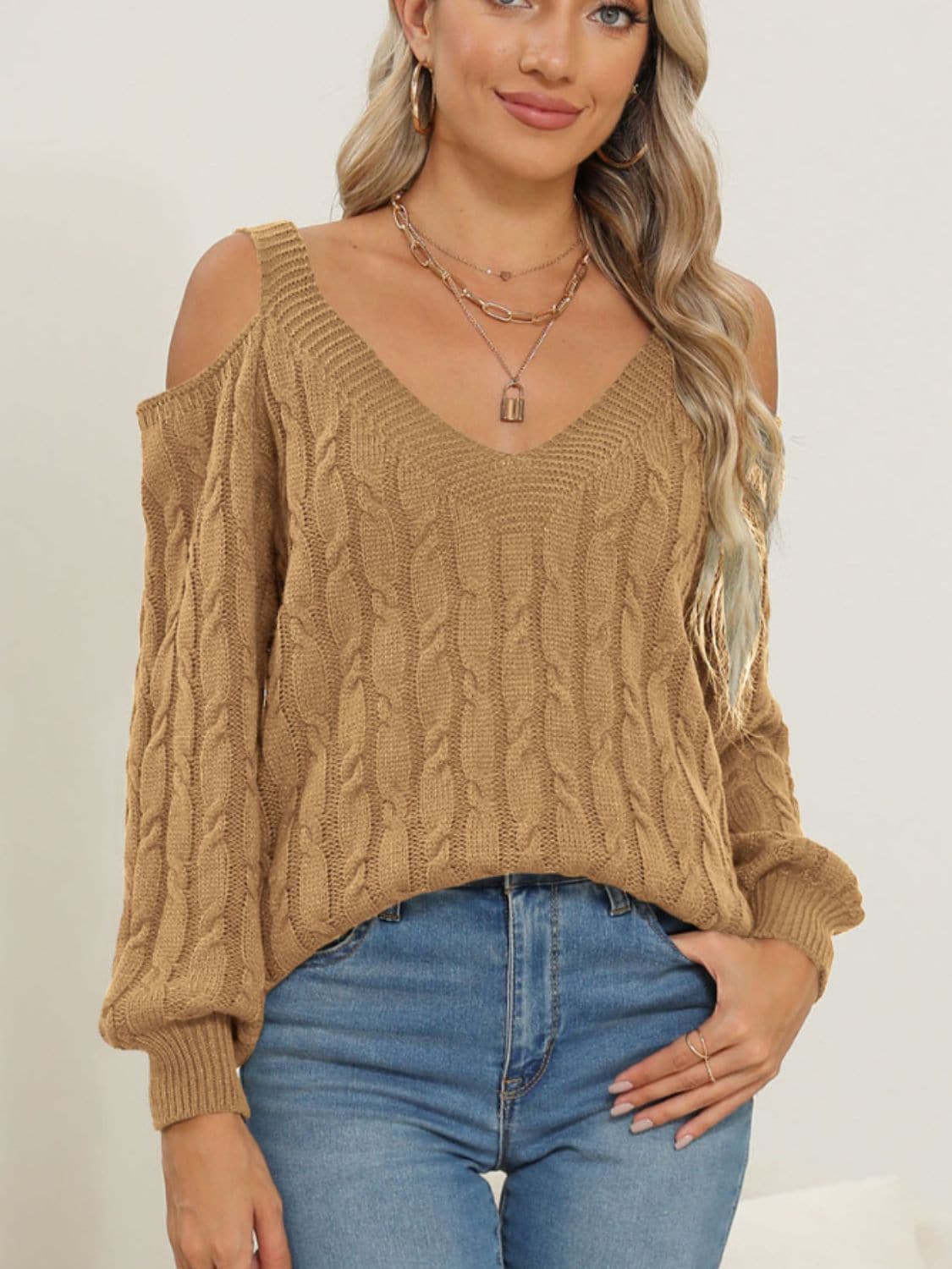 Cozy cable-knit v-neck pullover sweater