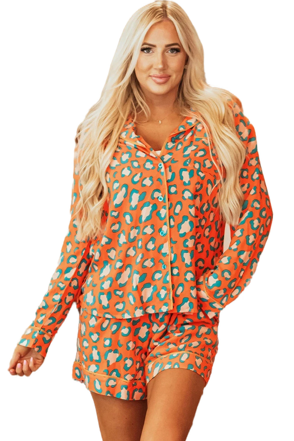 Leopard print loungewear set with long sleeves and shorts in vibrant orange