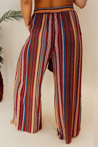 Vibrant red bohemian wide leg pants with ethnic stripes and tie waist