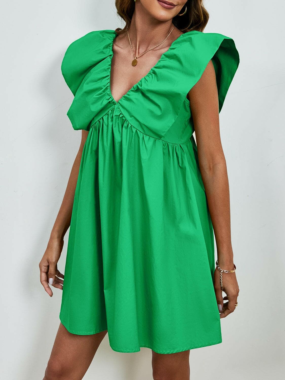 V-Neck Cap Sleeve Mini DressUpgrade Your Style with Our V-Neck Cap Sleeve Mini Dress
 Step out in confidence and elegance with our V-Neck Cap Sleeve Mini Dress, a versatile piece that effortlesLove Salve -Neck Cap Sleeve Mini Dress