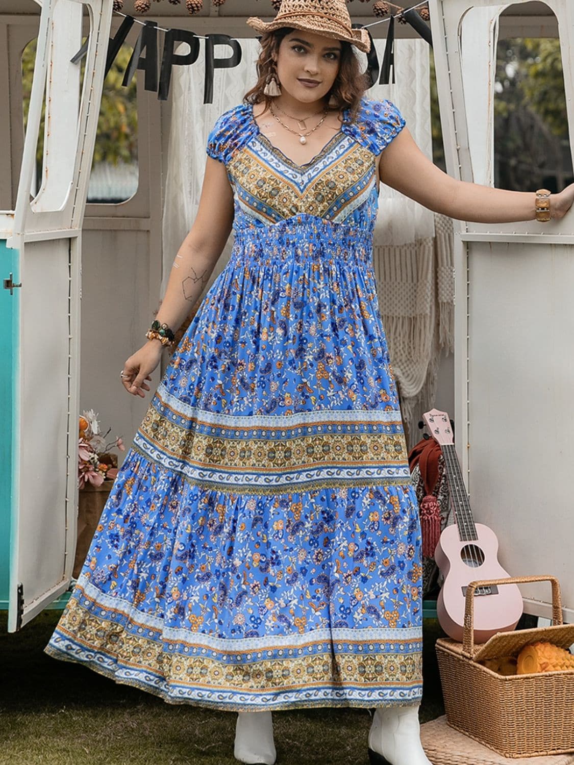 Plus Size Smocked Printed Cap Sleeve Dress.