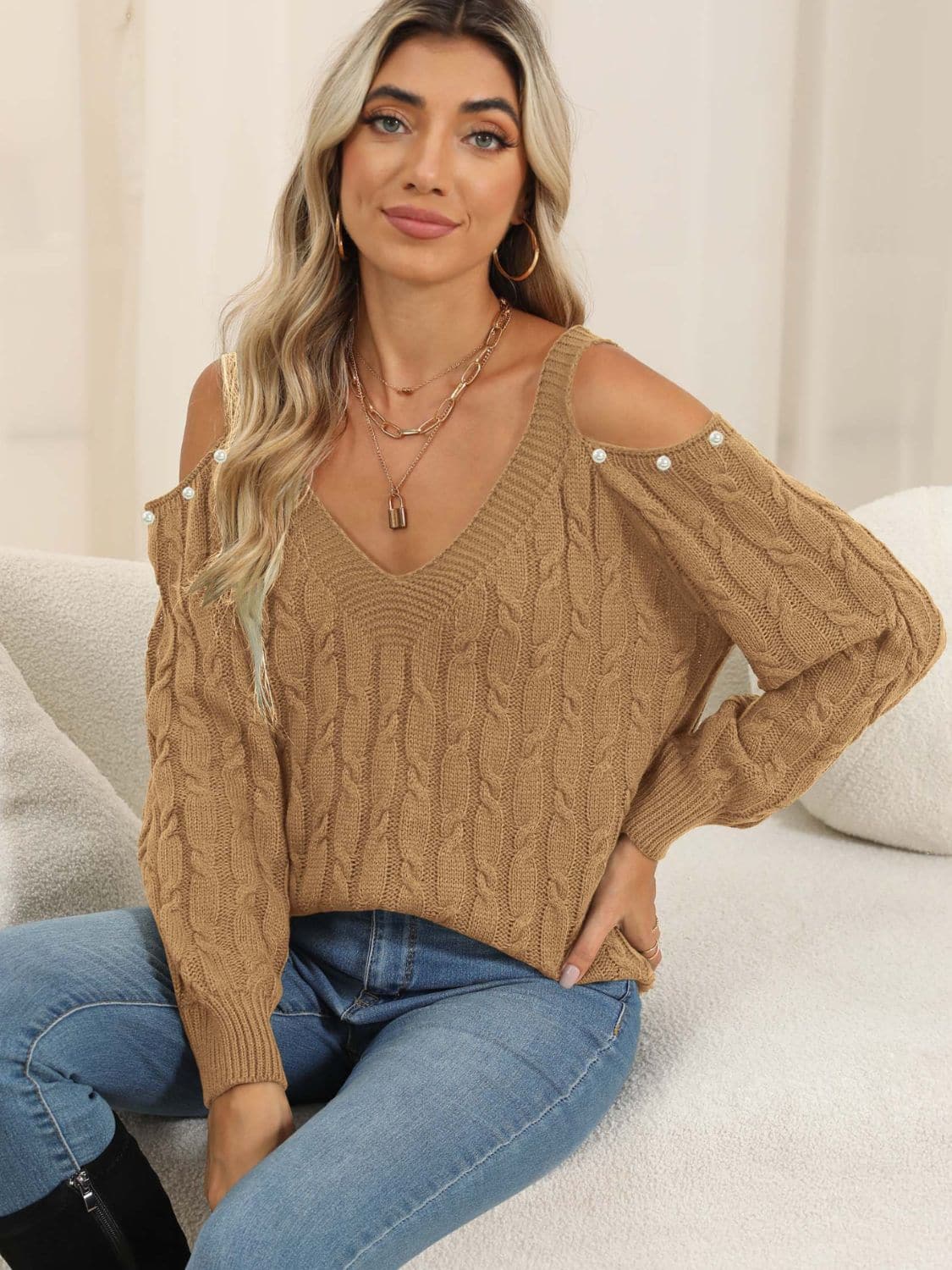 Chic cable-knit cold shoulder sweater