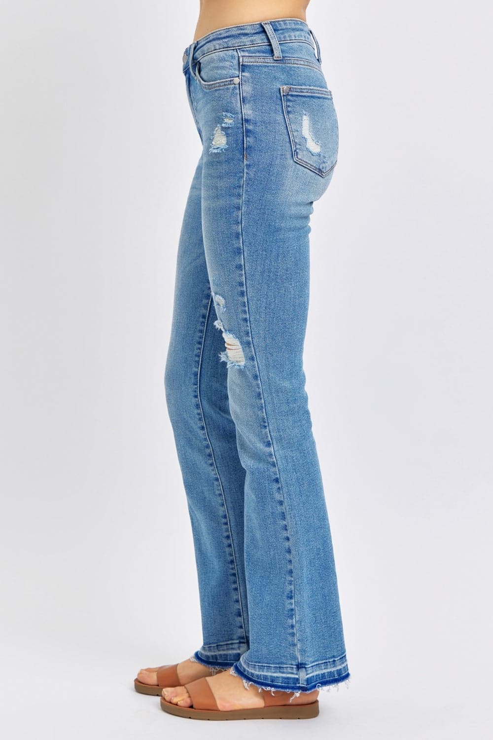 Judy Blue Full Size Mid Rise Destroyed Hem Distressed Jeans.