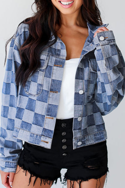 Light blue checkered patchwork denim jacket with button-up front and flap pockets.