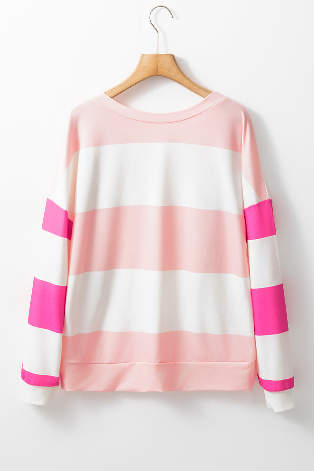 Chic light pink colorblock long sleeve top with drop shoulders