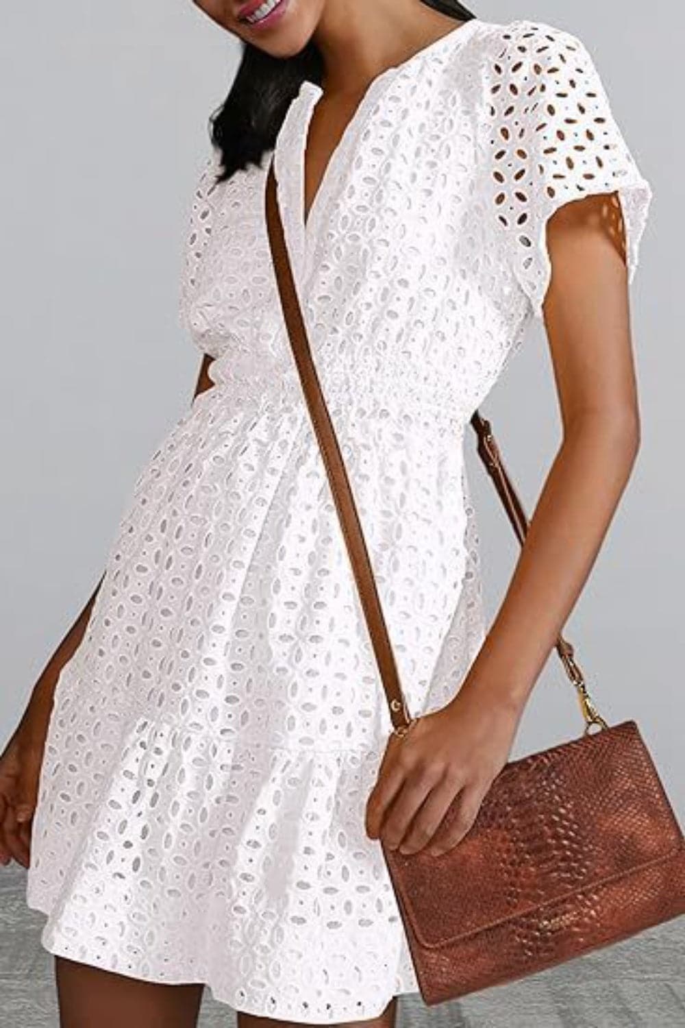 Sheer eyelet mini dress with sleeves