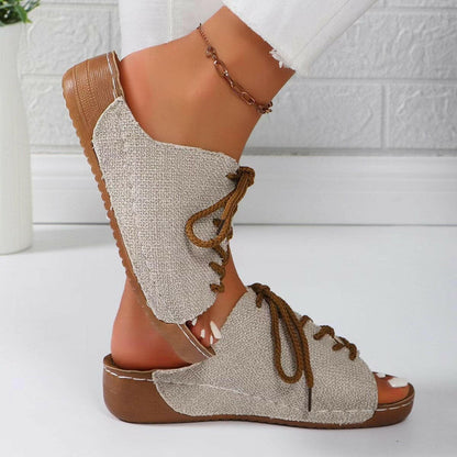 Lace-Up Open Toe Wedge SandalsStep Up Your Style with Lace-Up Open Toe Wedge Sandals
 Indulge in fashion-forward comfort with our Lace-Up Open Toe Wedge Sandals. Elevate your look with these stylLove Salve Open Toe Wedge Sandalsjust arrived