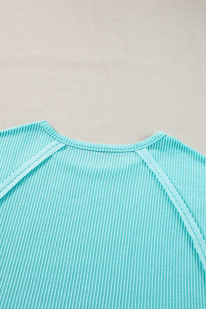 Light blue ribbed t-shirt with exposed seams for plus size comfort